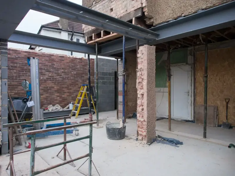 Structural remodel in progress with new steel beams and props in Christchurch