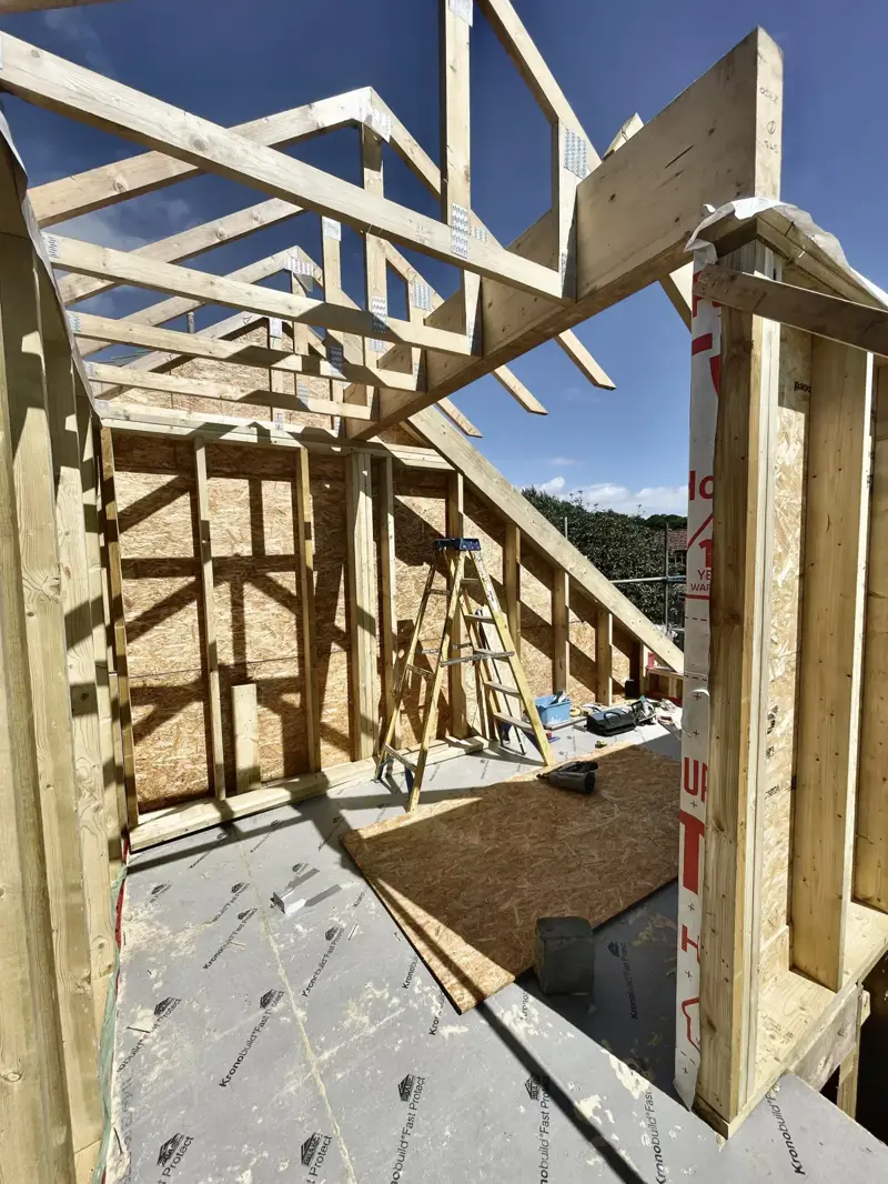 Timber-framed dormer loft conversion under construction in Dorset