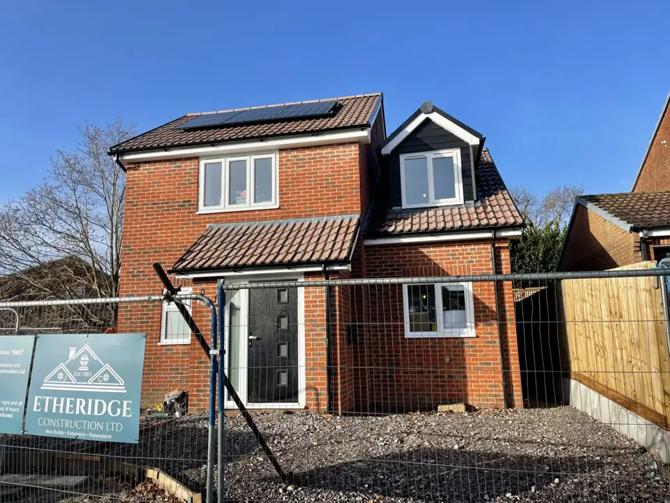 Detached new build with dormer and solar panels in Christchurch